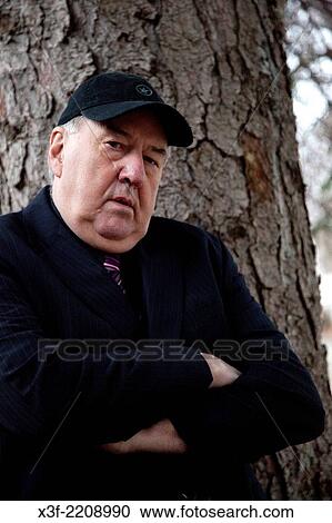 Infamous photographer Steve Skjold dressed in serious black. St Paul Minnesota MN USA. View Large Photo Image Stock Image - Infamous photographer Steve Skjold dressed in serious black. St Paul Minnesota MN USA.. Fotosearch