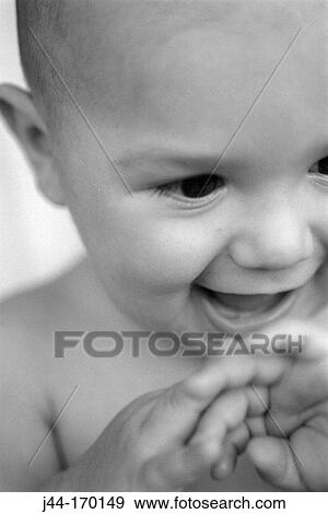 Infant boy smiling View Large Photo Image Stock Photo - Infant boy smiling. Fotosearch