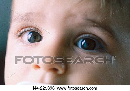 Stock Photograph - Infant boy's face. Fotosearch