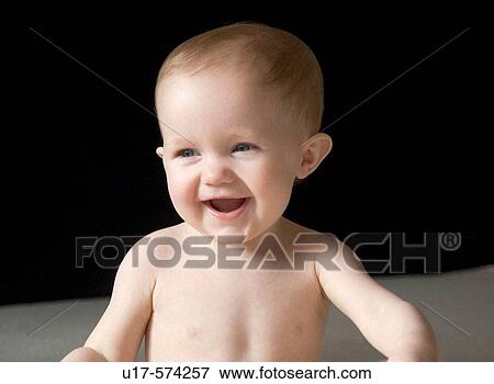 Stock Photo - Infant girl with big smile.. Fotosearch