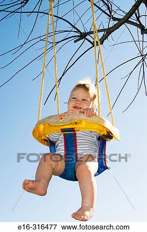 infant on swing View Large Photo Image Stock Photo - infant on swing. Fotosearch