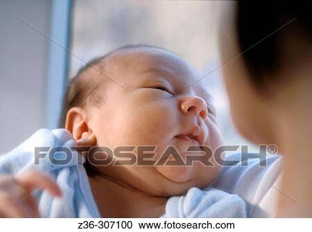 Infant with mother View Large Photo Image Stock Image - Infant with mother. Fotosearch