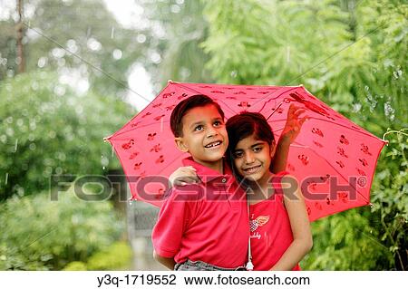 Innocence in the rain View Large Photo Image Stock Image - Innocence in the rain. Fotosearch