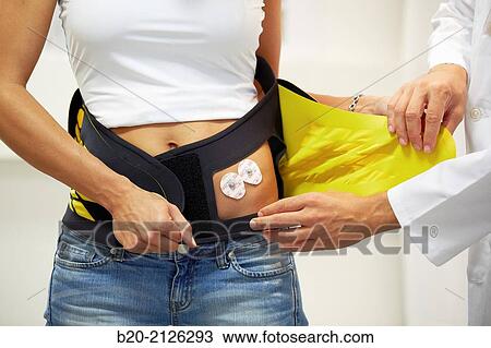 Stock Image - Innovative belt against back pain.. Fotosearch