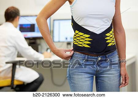 Innovative belt against back pain. View Large Photo Image Stock Image - Innovative belt against back pain.. Fotosearch