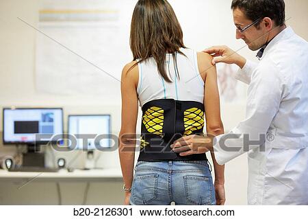 Innovative belt against back pain. View Large Photo Image Stock Image - Innovative belt against back pain.. Fotosearch