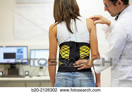 Innovative belt against back pain. View Large Photo Image Stock Image - Innovative belt against back pain.. Fotosearch