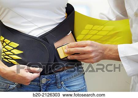 Innovative belt against back pain. View Large Photo Image Stock Image - Innovative belt against back pain.. Fotosearch