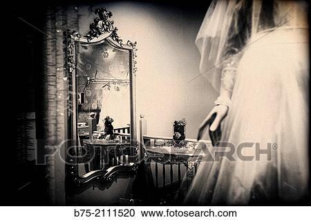 Inside a bridal shop with a mannequin in the foreground, a mirror and a console. London, England, UK, Europe. View Large Photo Image Stock Image - Inside a bridal shop with a mannequin in the foreground, a mirror and a console. London, England, UK, Europe.. Fotosearch