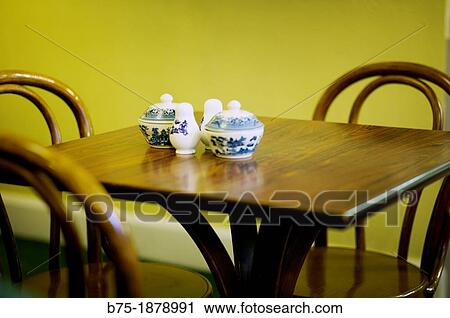inside of a coffee shop with a set up table View Large Photo Image Stock Image - inside of a coffee shop with a set up table. Fotosearch