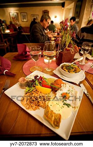 Inside of the Restaurant _ Dragseth's Gasthof in Husum, old inn dating from 1584. Mixed dish with varieties of fish and shrimp in the area. Husum, North Friesian Islands, Schleswig-Holstein, Germany, Europe. View Large Photo Image Stock Image - Inside of the Restaurant _ Dragseth's Gasthof in Husum, old inn dating from 1584. Mixed dish with varieties of fish and shrimp in the area. Husum, North Friesian Islands, Schleswig-Holstein, Germany, Europe.. Fotosearch