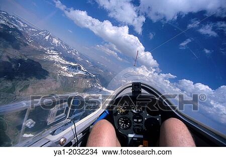 Inside view of glider plane flying over Pena Collarada mountains, Aragon, Spain View Large Photo Image Picture - Inside view of glider plane flying over Pena Collarada mountains, Aragon, Spain. Fotosearch