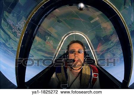 Inside view of pilot during aerobatic flight with Yak-52 Russian plane, Pirmasens, Germany View Large Photo Image Stock Image - Inside view of pilot during aerobatic flight with Yak-52 Russian plane, Pirmasens, Germany. Fotosearch