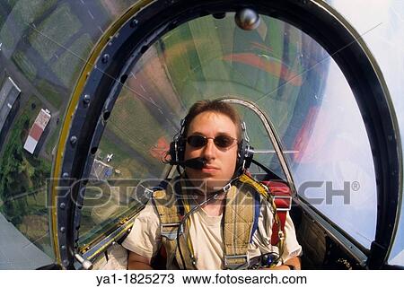 Inside view of pilot during aerobatic flight with Yak-52 Russian plane, Pirmasens aerodrome, Germany View Large Photo Image Stock Image - Inside view of pilot during aerobatic flight with Yak-52 Russian plane, Pirmasens aerodrome, Germany. Fotosearch