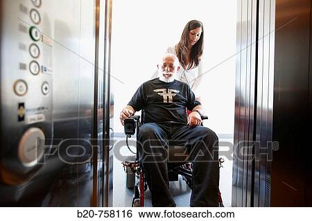 Stock Photograph - Intelligent power wheelchair developed by Health and Quality of life Unit, FIK technology research program for aged and disabled people. Fatronik-Tecnalia, Research and Technology Center, Donostia, Basque Country, Spain. Fotosearch