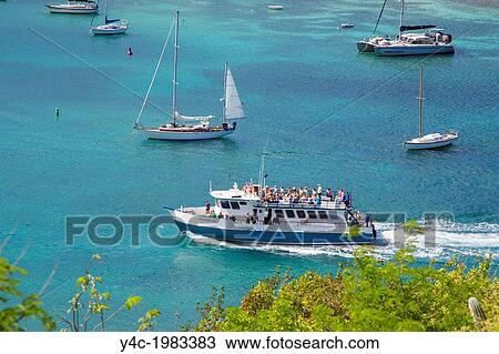 Interialand ferry in harbor in Cruz Bay on the Caribbean Island of St John in the US Virgin Islands. View Large Photo Image Stock Image - Interialand ferry in harbor in Cruz Bay on the Caribbean Island of St John in the US Virgin Islands.. Fotosearch