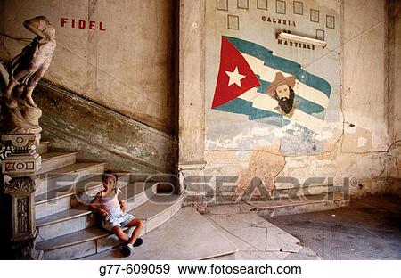 Interior of old palace with Cuban flag and portrait of Camillo Cienfuegos. Havana. Cuba View Large Photo Image Stock Photo - Interior of old palace with Cuban flag and portrait of Camillo Cienfuegos. Havana. Cuba. Fotosearch