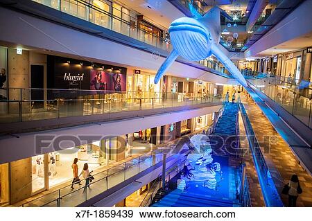 Interior of Omotesando Hills, shopping mall designed by Tadao Ando in Omotesando street Tokyo Japan View Large Photo Image Stock Photo - Interior of Omotesando Hills, shopping mall designed by Tadao Ando in Omotesando street Tokyo Japan. Fotosearch