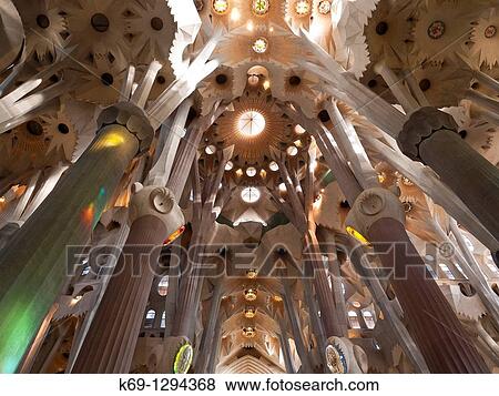 Interior of the Sagrada Familia temple by architect Gaudi, Barcelona, Catalonia, Spain View Large Photo Image Stock Photo - Interior of the Sagrada Familia temple by architect Gaudi, Barcelona, Catalonia, Spain. Fotosearch
