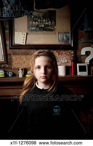 Interior, Sullen looking 12 year old girl, facing the camera, UK View Large Photo Image Stock Photo - Interior, Sullen looking 12 year old girl, facing the camera, UK. Fotosearch