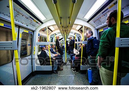 Interior view from a tube, district line, London, UK View Large Photo Image Stock Photo - Interior view from a tube, district line, London, UK. Fotosearch