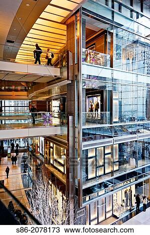 Interior View of The Shops at Time Warner Center, Columbus Circle, Manhattan, New York City, a Vertical, Multi-Story, Urban Mall. View Large Photo Image Stock Image - Interior View of The Shops at Time Warner Center, Columbus Circle, Manhattan, New York City, a Vertical, Multi-Story, Urban Mall.. Fotosearch