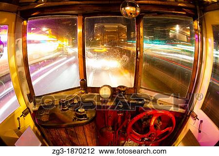 Interior view of Trolley at night, long exposure, Downtown Dallas, Texas, USA View Large Photo Image Stock Image - Interior view of Trolley at night, long exposure, Downtown Dallas, Texas, USA. Fotosearch