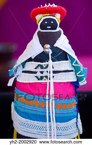 Stock Image - International Folk Art Market in Santa Fe, New Mexico. More than 190 artists and craftsmen from 60 countries from all over the globe. Lulama Sihlabeni from the eKhaya eKasi art center in South Aferica,.. Fotosearch