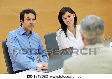 Stock Image - Interview, Coaching, Selling, Business, Donostia, San Sebastian, Basque Country, Spain.. Fotosearch