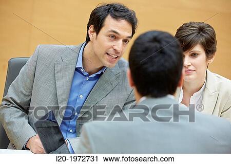 Stock Image - Interview, Coaching, Selling, Business, Donostia, San Sebastian, Basque Country, Spain.. Fotosearch