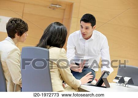 Stock Image - Interview, Coaching, Selling, Business, Donostia, San Sebastian, Basque Country, Spain.. Fotosearch