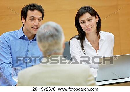 Stock Photo - Interview, Coaching, Selling, Business, Donostia, San Sebastian, Basque Country, Spain.. Fotosearch