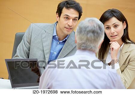 Stock Photo - Interview, Coaching, Selling, Business, Donostia, San Sebastian, Basque Country, Spain.. Fotosearch