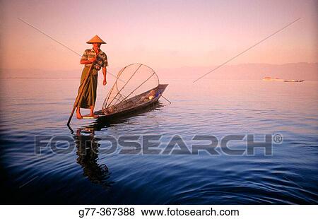 Intha fisherman. Inle Lake. Shan State. Myanmar. View Large Photo Image Stock Photo - Intha fisherman. Inle Lake. Shan State. Myanmar.. Fotosearch