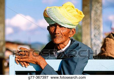 Stock Photo - Intha old man. Inle Lake. Shan State. Myanmar.. Fotosearch