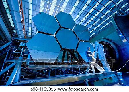 Stock Photography - Into the Looking Glass Recently, technicians at NASA? s Marshall Space Flight Center in Huntsville, Ala, completed a series of cryogenic tests on six James Webb Space Telescope beryllium mirror segments at the center's X-ray & Cryogenic Facility. Fotosearch
