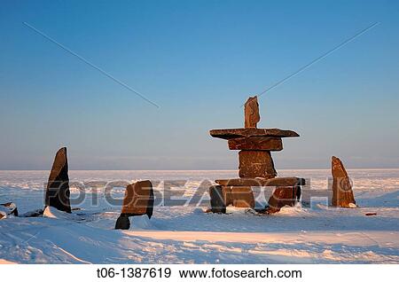 Stock Photo - Inukshuk in town of Churchill on the stores of Hudson Bay, Manitoba, Canada. Fotosearch