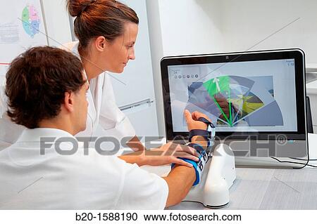 Investigator and patient with assistive robot for upper limb rehabilitation at home View Large Photo Image Stock Image - Investigator and patient with assistive robot for upper limb rehabilitation at home. Fotosearch