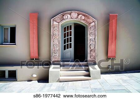Stock Image - Inviting, Open Door, Oia, Santorini, Greece (Greek Islands).. Fotosearch