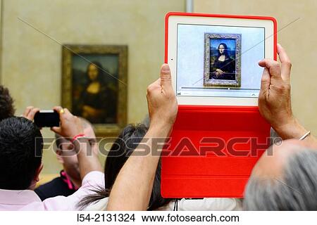 Picture - Ipad Mona Lisa Painting The Louvre Museum Paris France Europe FR City of Lights Da Vinci.. Fotosearch