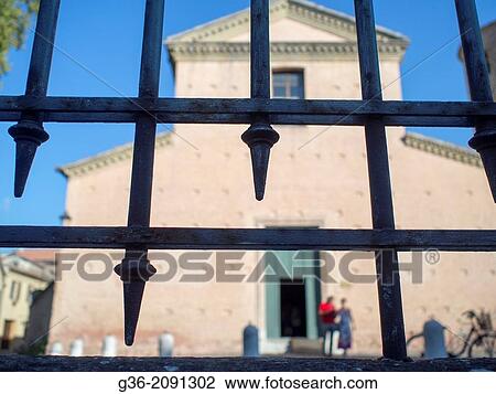 Ironwork fence, with church in the background in Ravenna, Ravenna, Italy. View Large Photo Image Stock Image - Ironwork fence, with church in the background in Ravenna, Ravenna, Italy.. Fotosearch