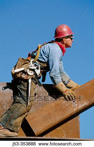 Ironworker, connector. Esquire Plaza building. Sacramento, California. USA View Large Photo Image Stock Photo - Ironworker, connector. Esquire Plaza building. Sacramento, California. USA. Fotosearch