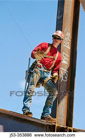 Ironworker, connector. Esquire Plaza Building. Sacramento, California. USA View Large Photo Image Stock Photograph - Ironworker, connector. Esquire Plaza Building. Sacramento, California. USA. Fotosearch