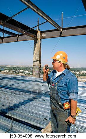 Ironworker crew foreman using radio. Sacramento, California. USA. View Large Photo Image Stock Photo - Ironworker crew foreman using radio. Sacramento, California. USA.. Fotosearch