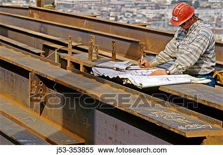 Ironworker foreman checks plans. Harris State Office Building. Oakland, California. USA. View Large Photo Image Stock Photography - Ironworker foreman checks plans. Harris State Office Building. Oakland, California. USA.. Fotosearch