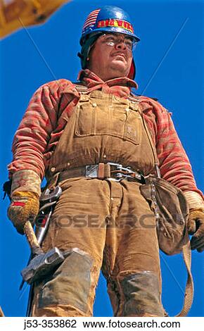 Ironworker. Harris State office building. Oakland, California. USA. View Large Photo Image Stock Image - Ironworker. Harris State office building. Oakland, California. USA.. Fotosearch