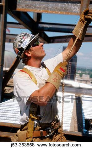 Ironworker,? Tagman?. Esquire plaza building. Sacramento, California. USA. View Large Photo Image Stock Photo - Ironworker,? Tagman?. Esquire plaza building. Sacramento, California. USA.. Fotosearch