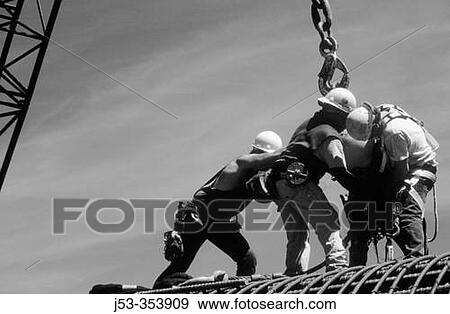 Ironworkers attaching load to crane. I-880 Cypress Project. Oakland, California. USA. View Large Photo Image Stock Photo - Ironworkers attaching load to crane. I-880 Cypress Project. Oakland, California. USA.. Fotosearch