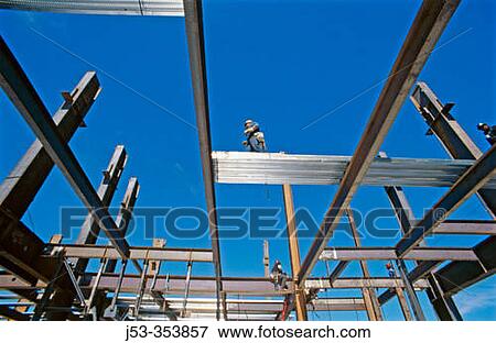 Ironworkers building high rise office. Sacramento, California. USA. View Large Photo Image Stock Photo - Ironworkers building high rise office. Sacramento, California. USA.. Fotosearch