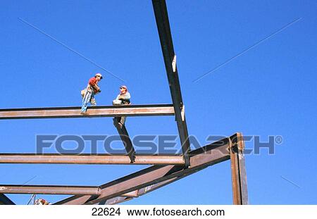 Ironworkers building steel high rise structure View Large Photo Image Picture - Ironworkers building steel high rise structure. Fotosearch